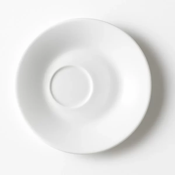 Sous tasse décalée